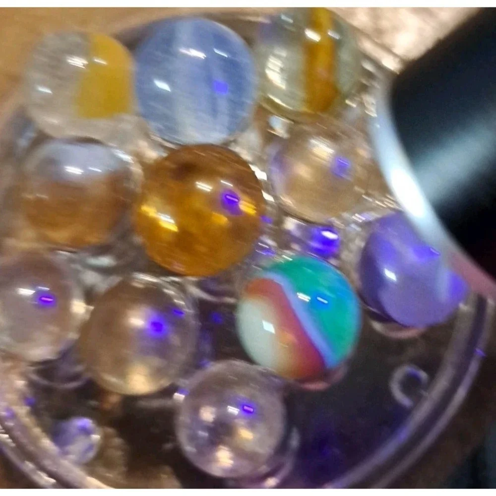 Lot Of 11 Estate Sale Marbles 1 UV Reactive.‎ Mostly Clear